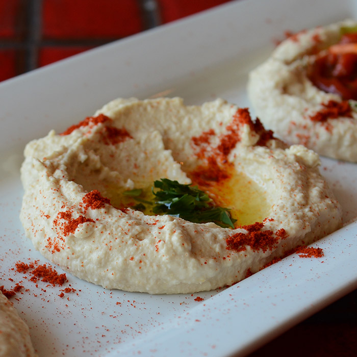 Hummus, perhaps the most essential Mediterranean an dMiddle Eastern appetizer, now made from scratch everyday at the heart of downtown Fairhope.